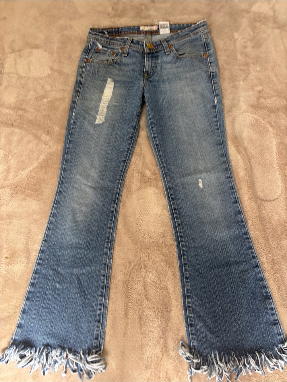 Levi's distressed 518 super low Blue Frayed Hem Flare Jeans